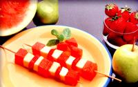 Brocheta de fruta variada con sanda